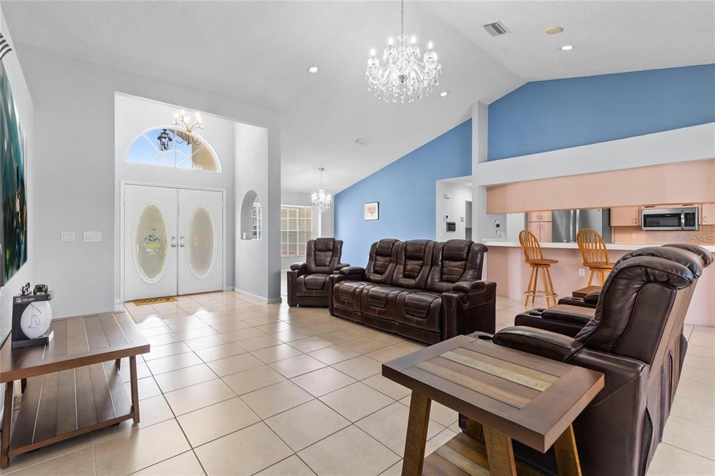 10446 Baylor Drive Spring Hill, FL 34608 - Photo 4 of 32 a living room with furniture