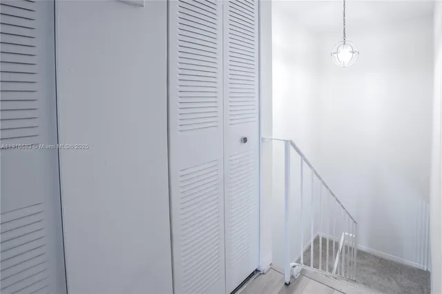 a view of a room with rack on the wall