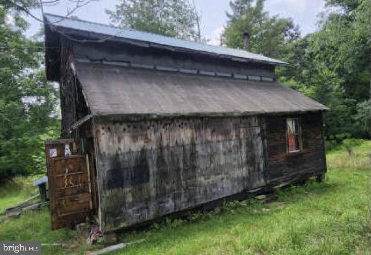 83 Ankney Lane Westover, PA 16692 - Photo 2 of 15 a view of backyard with green space