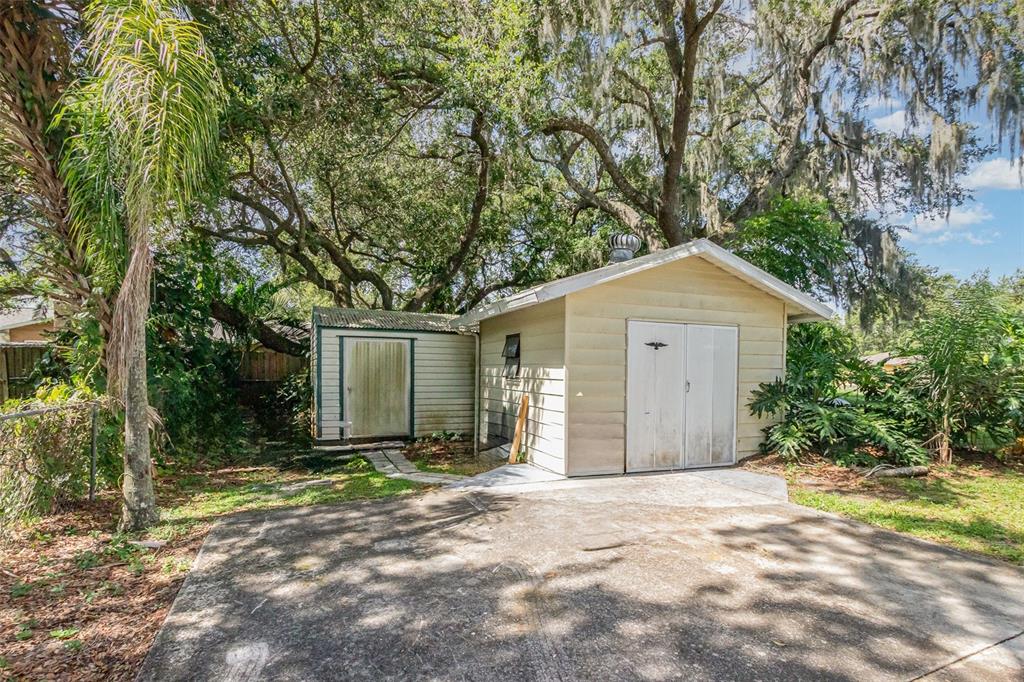 6476 Eve Street St. Cloud, FL 34771 - Photo 25 of 25 a front view of house with yard and trees