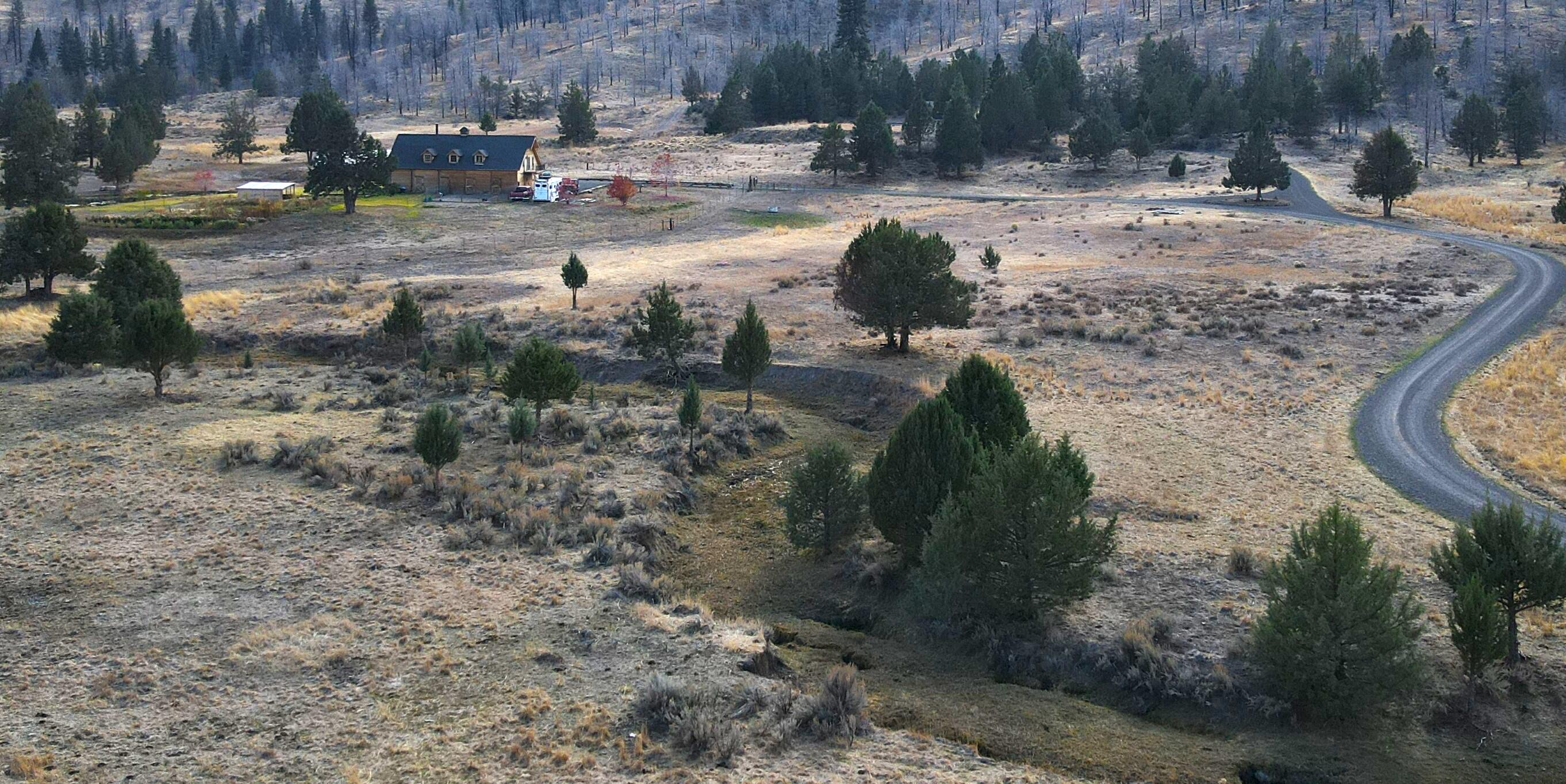 2415 Co Road Canby, CA 96015 - Photo 71 of 74 a view of a yard with fire pit