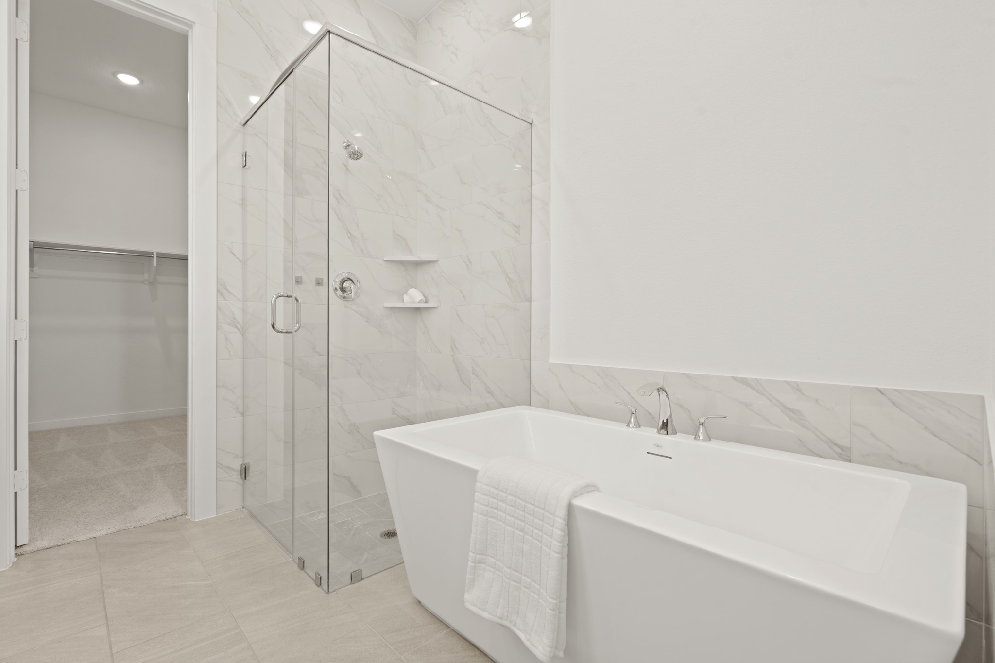 7303 Compass Drive Katy, TX 77493 - Photo 18 of 31 a bathroom with a sink a toilet and shower