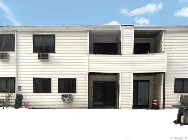 a view of a house with a large window