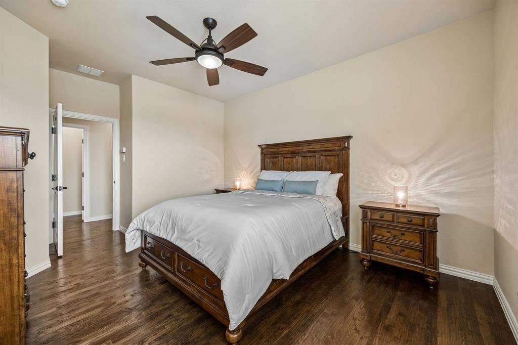 1005 Berkshire Road Southlake, TX 76092 - Photo 34 of 40 a bedroom with a bed and a ceiling fan