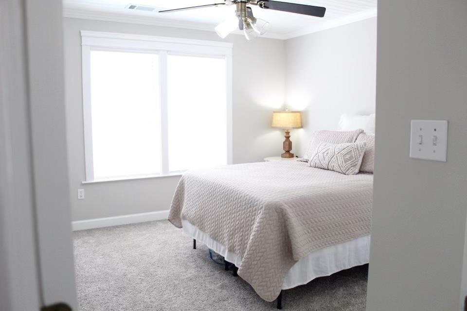 440 Stewart Road Eads, TN 38028 - Photo 17 of 25 Bedroom featuring carpet, ornamental molding, and ceiling fan