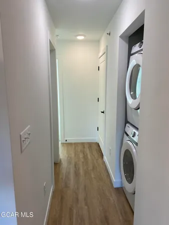a view of bathroom with washer and dryer