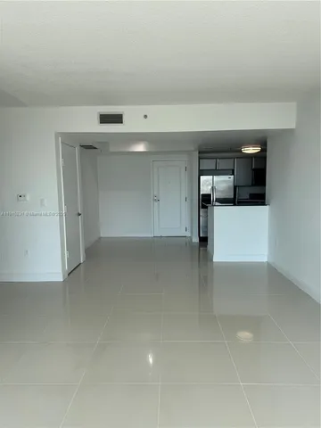 a bathroom with a granite countertop sink a toilet and with granite