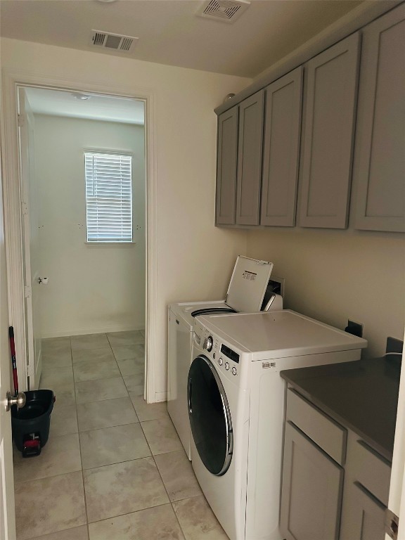 608 Sixpence Lane Georgetown, TX 78628 - Photo 16 of 27 a utility room with dryer and washer