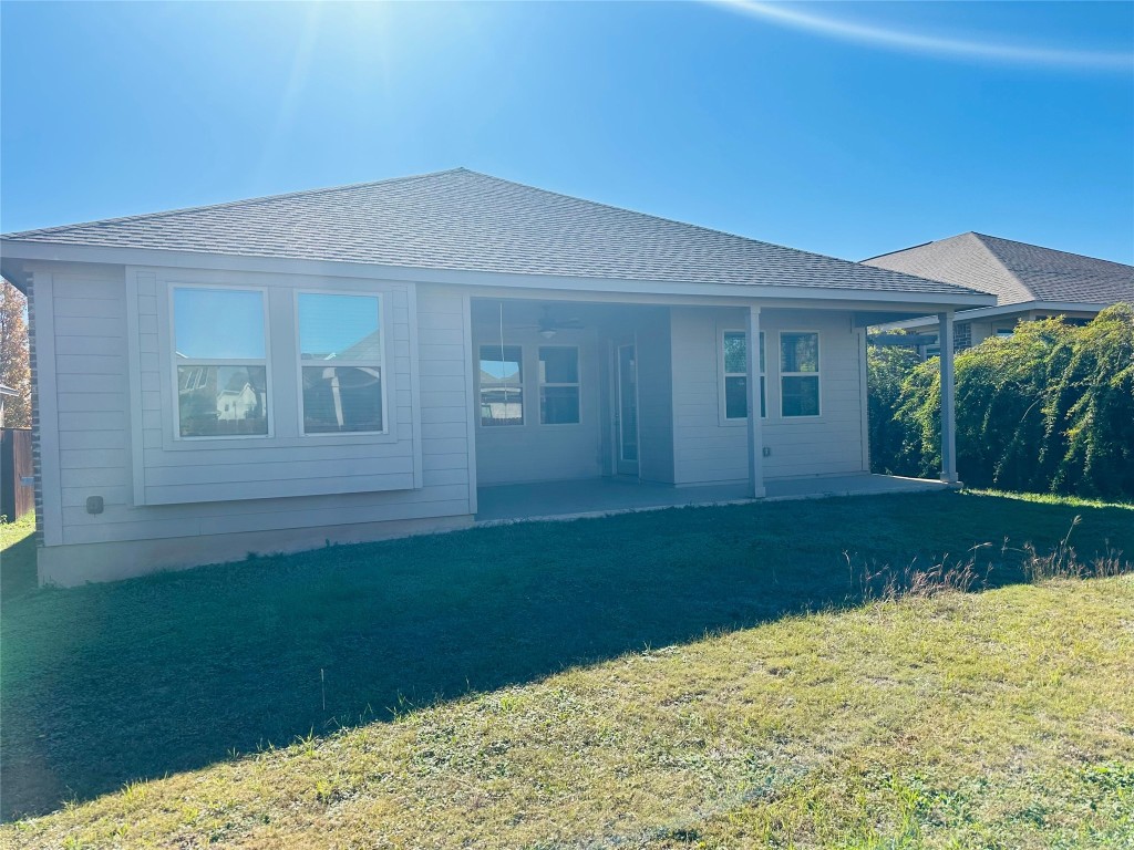 608 Sixpence Lane Georgetown, TX 78628 - Photo 27 of 27 a house view with a backyard space