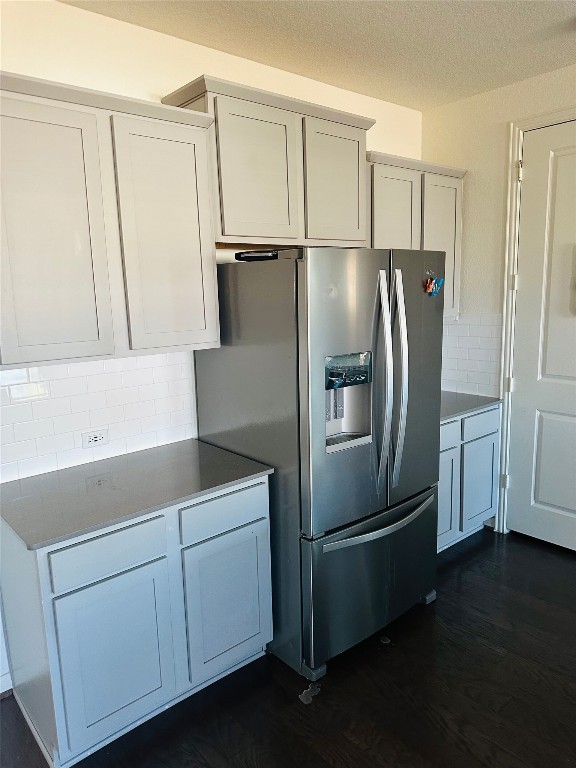 608 Sixpence Lane Georgetown, TX 78628 - Photo 6 of 27 a kitchen with cabinets and stainless steel appliances