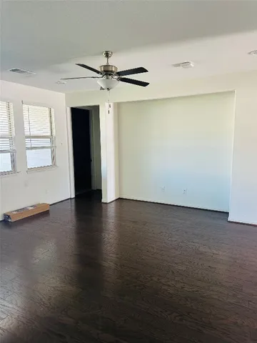 a kitchen with refrigerator and sink