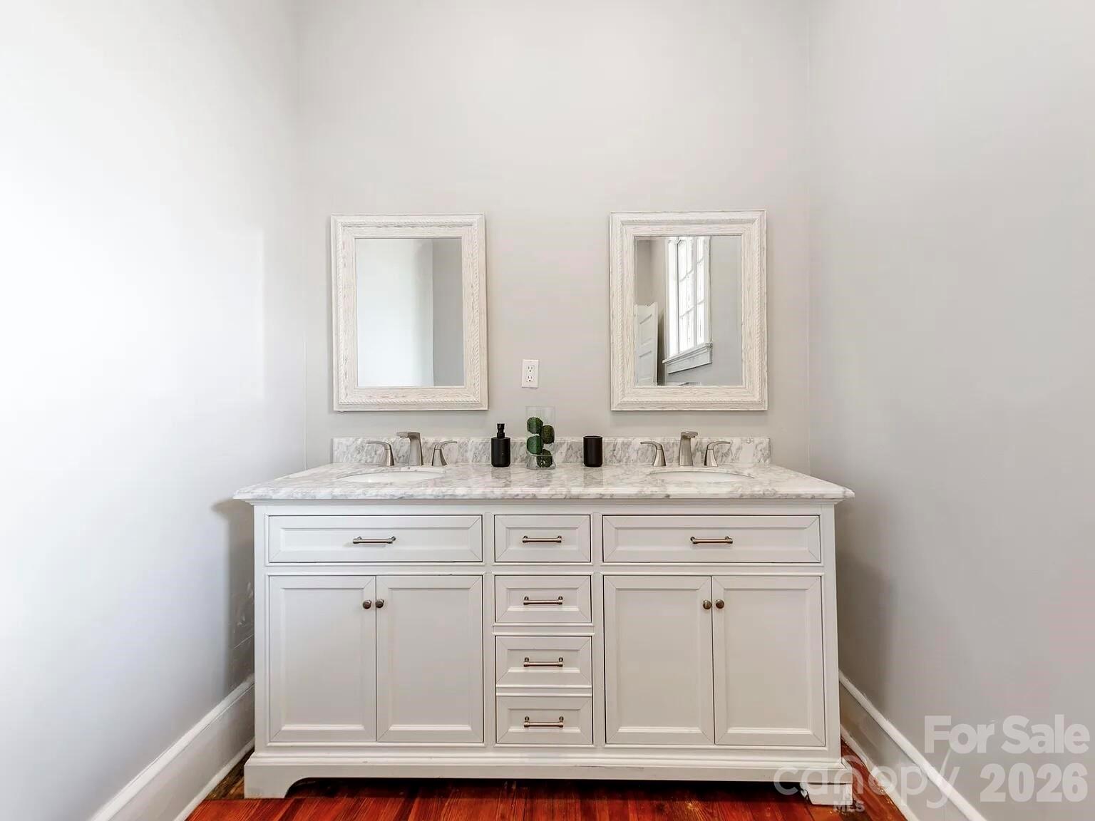 128 West End Street Chester, SC 29706 - Photo 21 of 40 a bathroom with a sink and a mirror