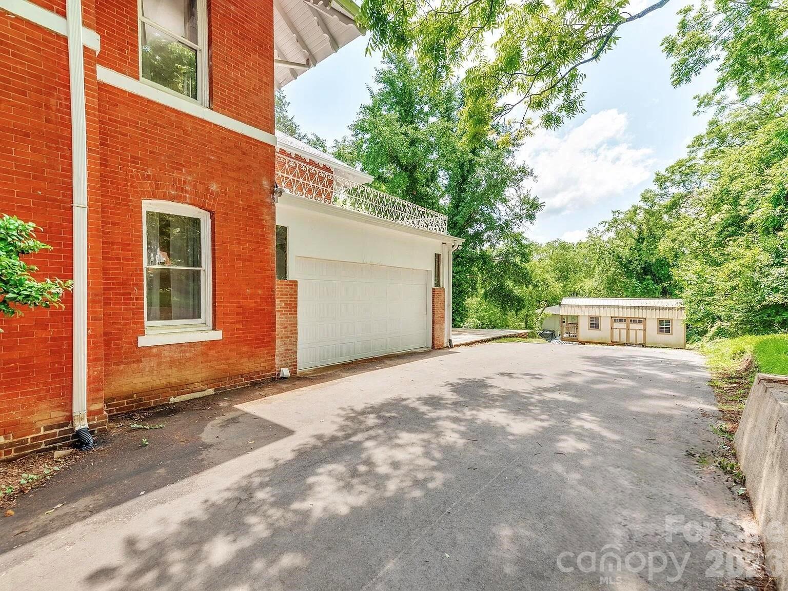 128 West End Street Chester, SC 29706 - Photo 38 of 40 a view of a house with a yard and garage