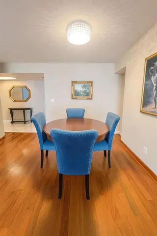 a workspace with furniture and wooden floor