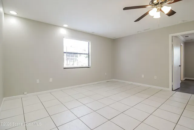 a view of an empty room and window