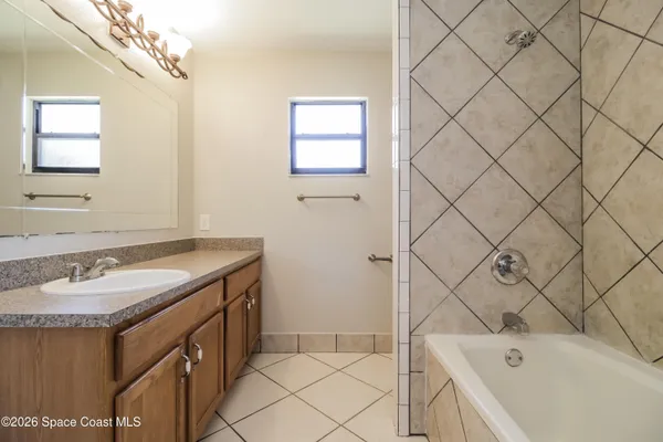 a bathroom with a sink and a bathtub