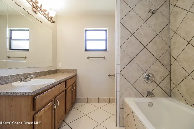 a bathroom with a sink and a bathtub