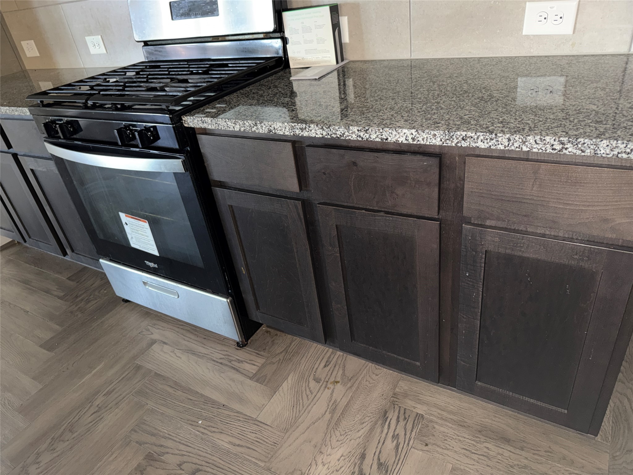 14622 Cypress Creek Landing Houston, TX 77068 - Photo 12 of 33 a kitchen with granite countertop a stove and a refrigerator
