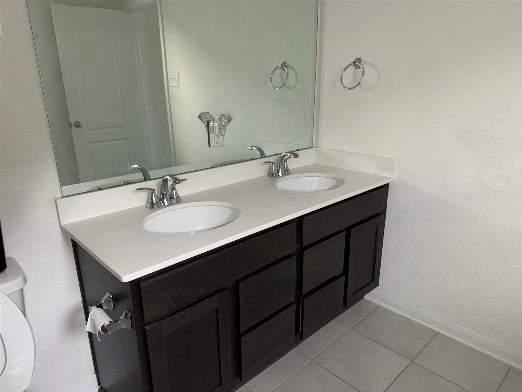 14622 Cypress Creek Landing Houston, TX 77068 - Photo 14 of 33 a bathroom with a sink vanity and a mirror
