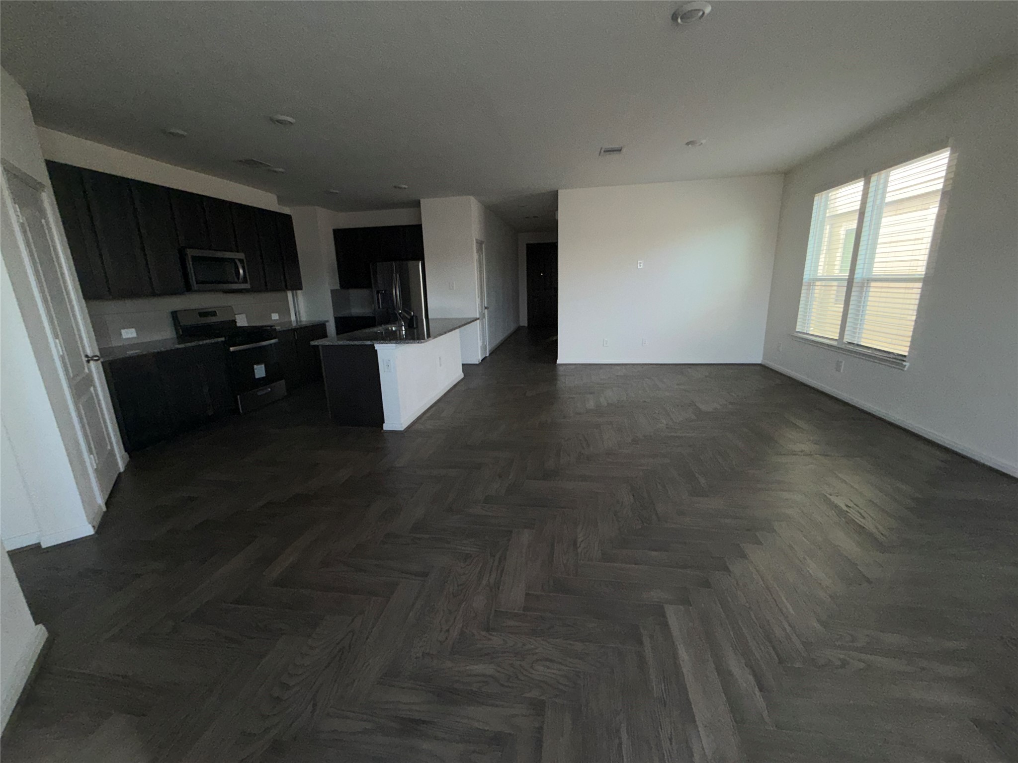 14622 Cypress Creek Landing Houston, TX 77068 - Photo 18 of 33 a living room with hard wood floor and a flat screen tv