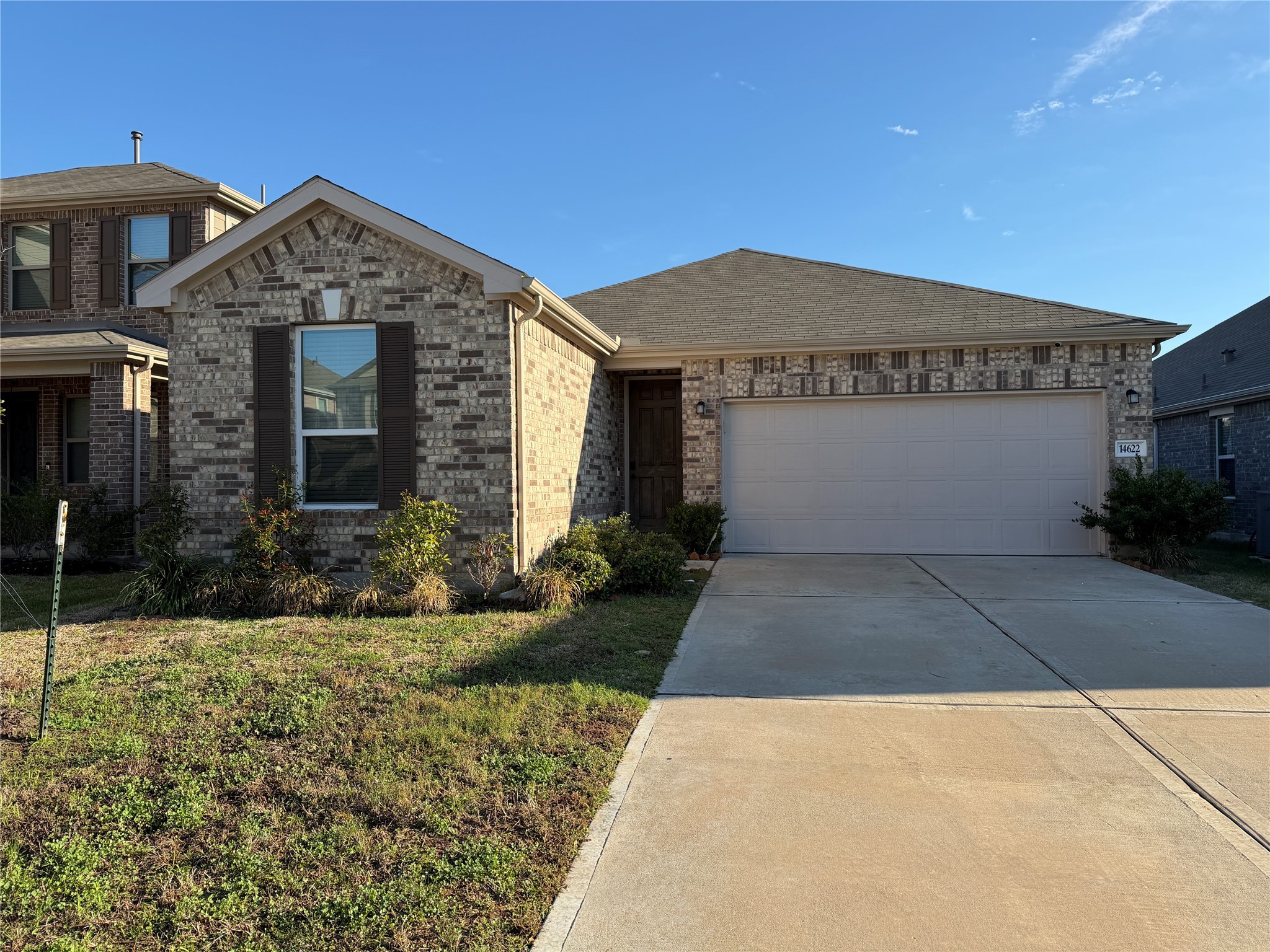 14622 Cypress Creek Landing Houston, TX 77068 - Photo 2 of 33 a front view of a house with a yard