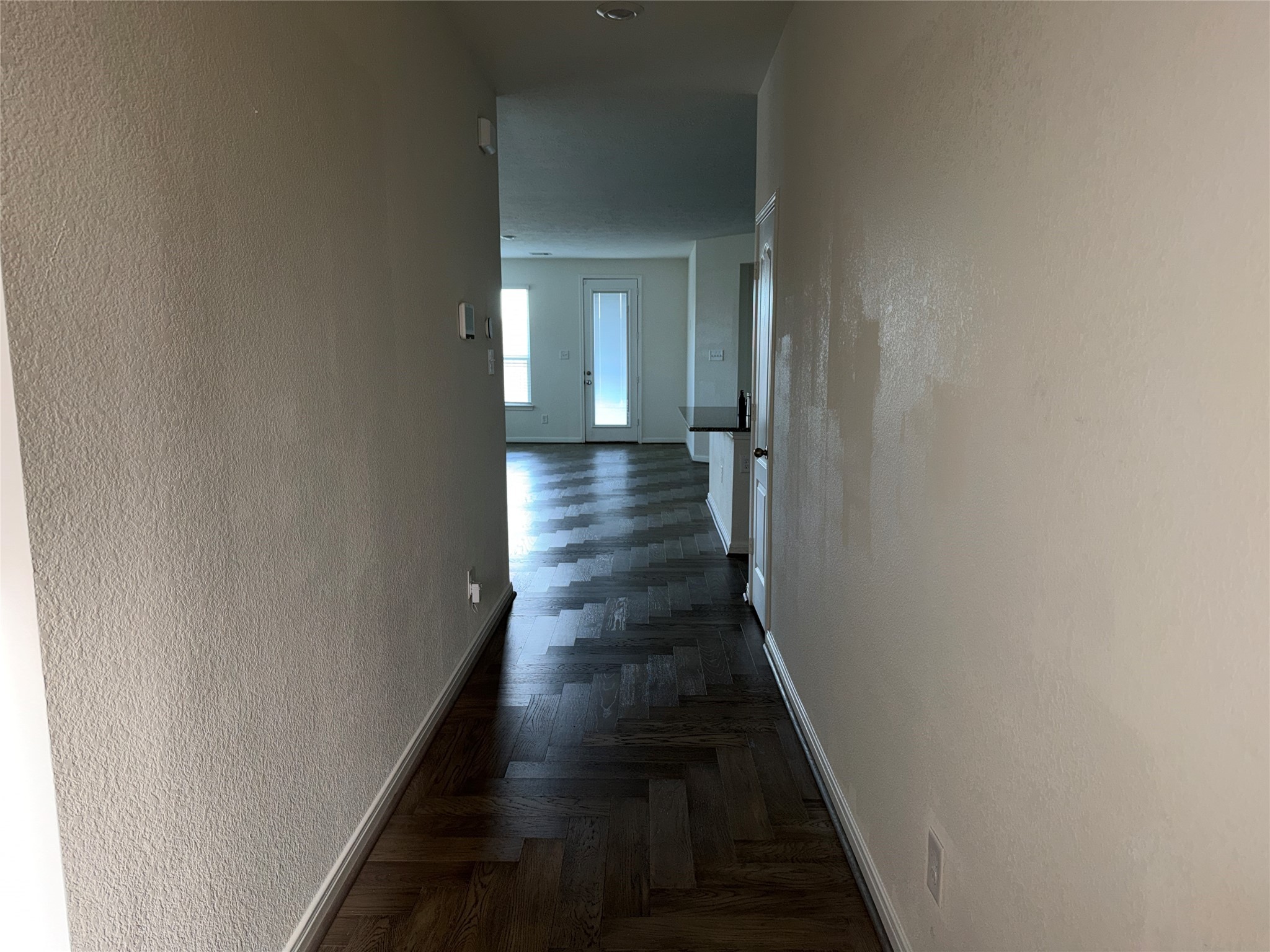 14622 Cypress Creek Landing Houston, TX 77068 - Photo 32 of 33 a view of a hallway with wooden floor