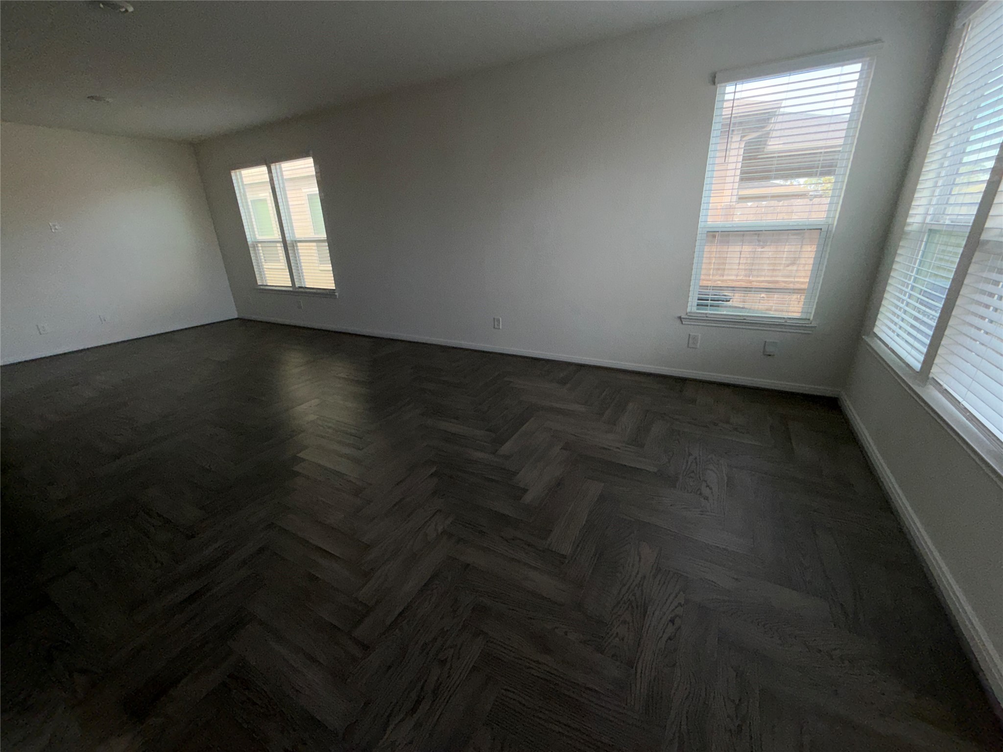 14622 Cypress Creek Landing Houston, TX 77068 - Photo 6 of 33 wooden floor in an empty room with a window