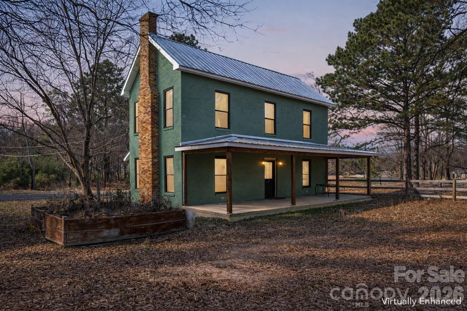 10799 Poplar Tent Road Huntersville, NC 28078 - Photo 2 of 46 a front view of a house with a yard