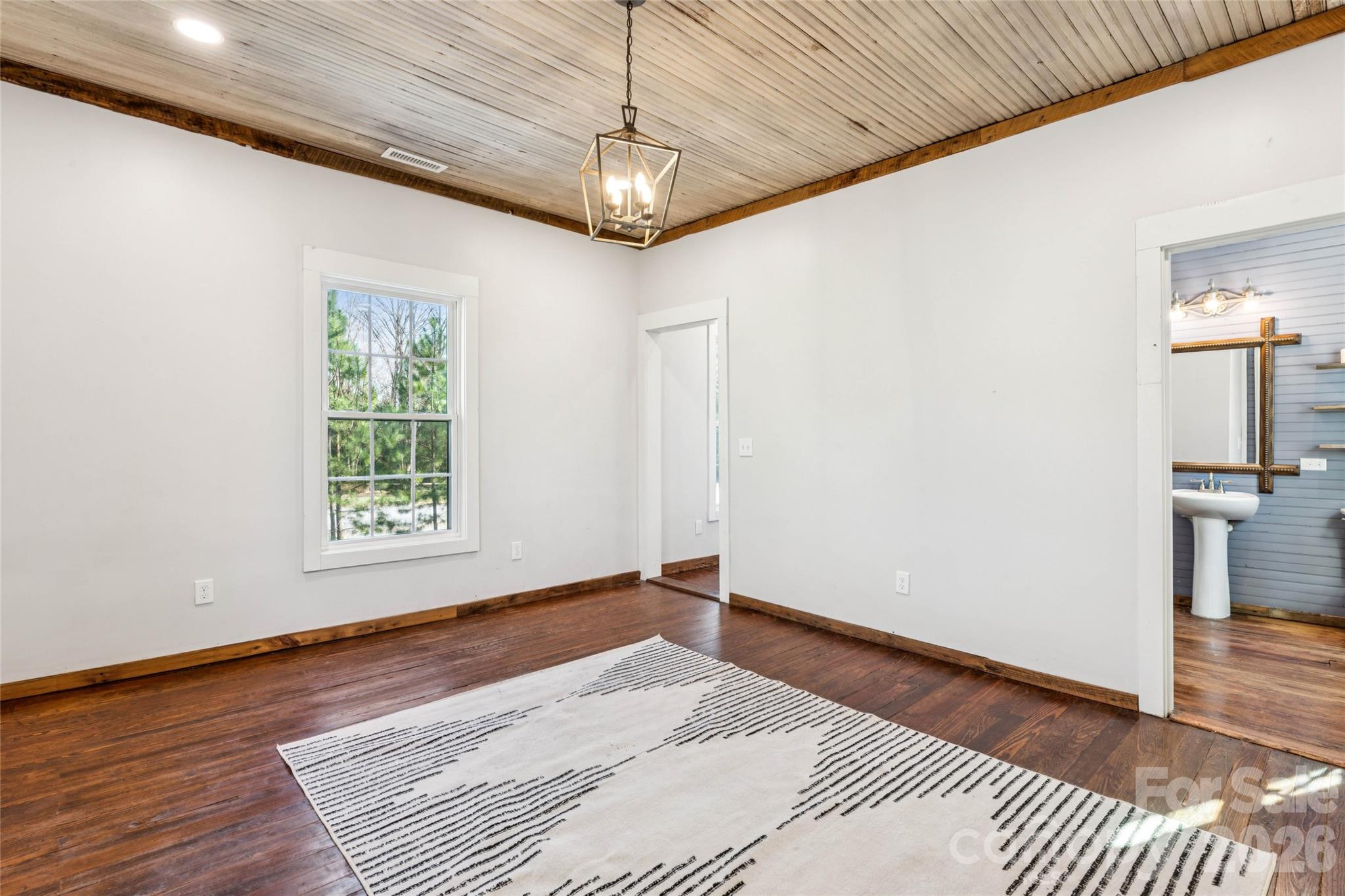 10799 Poplar Tent Road Huntersville, NC 28078 - Photo 29 of 46 a view of a livingroom with a window