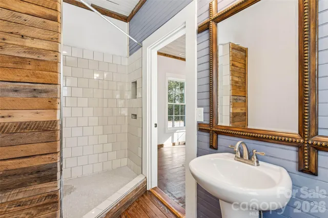 a bathroom with a bathtub and a sink