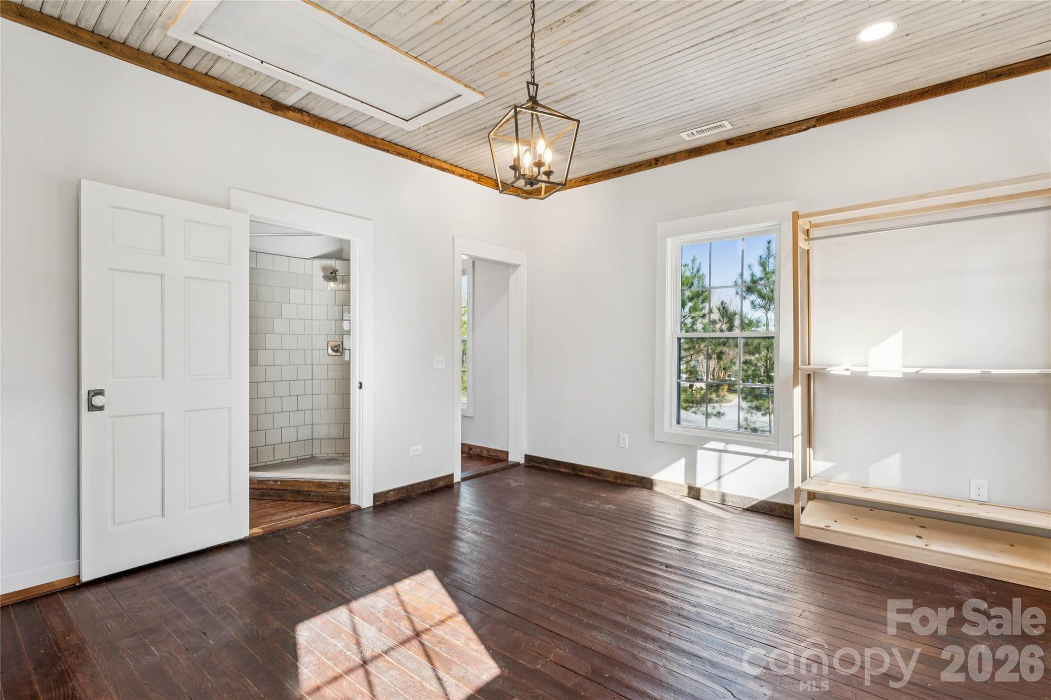 10799 Poplar Tent Road Huntersville, NC 28078 - Photo 35 of 46 a view of livingroom with hardwood floor and window