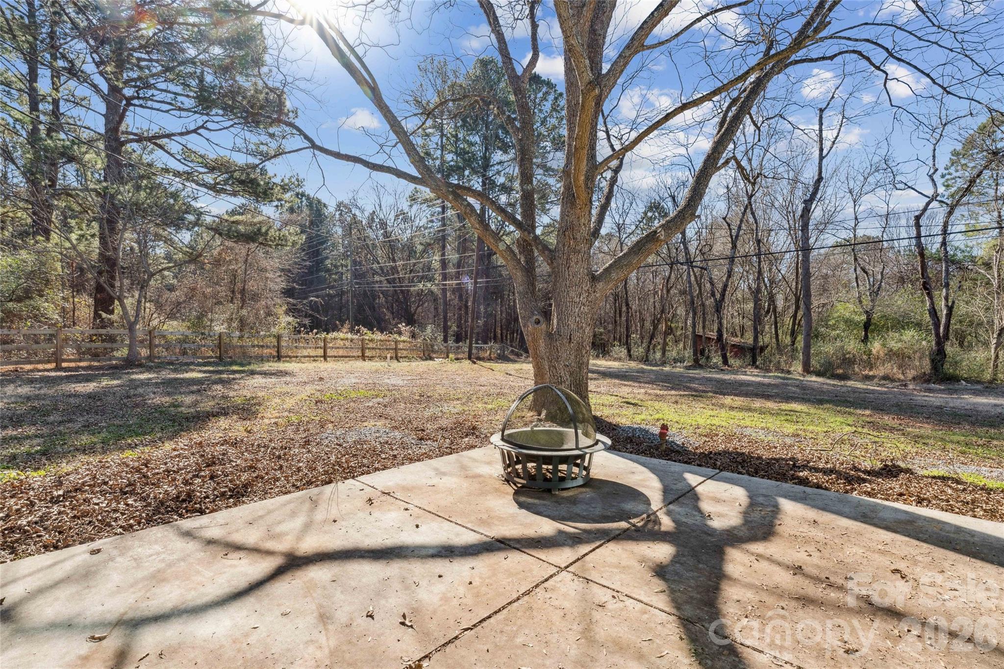 10799 Poplar Tent Road Huntersville, NC 28078 - Photo 37 of 46 a view of a yard with a tree