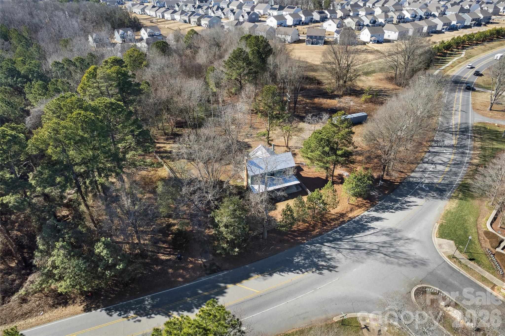 10799 Poplar Tent Road Huntersville, NC 28078 - Photo 46 of 46 an aerial view of a house with a yard