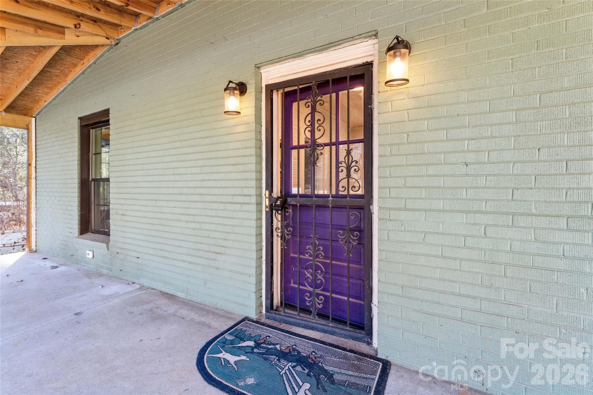 10799 Poplar Tent Road Huntersville, NC 28078 - Photo 5 of 46 a front view of a house with glass windows