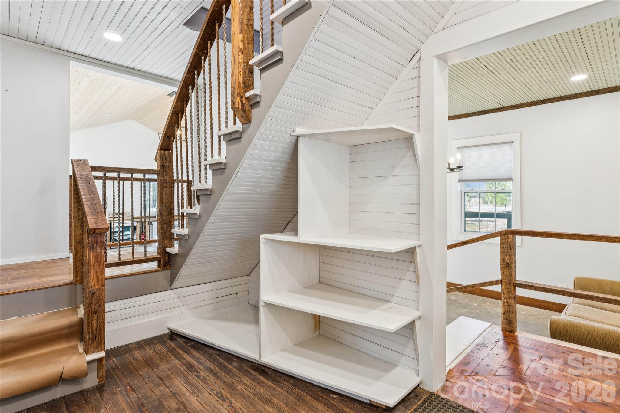 10799 Poplar Tent Road Huntersville, NC 28078 - Photo 7 of 46 a view of entryway and hall with wooden floor