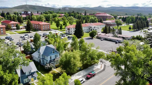 an aerial view of a house with a garden