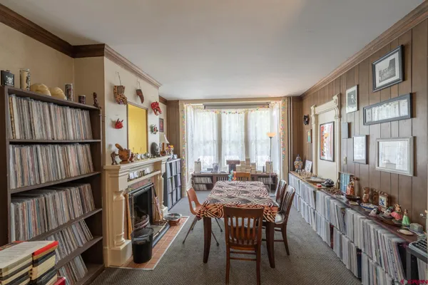 a view of a livingroom with furniture window and entryway