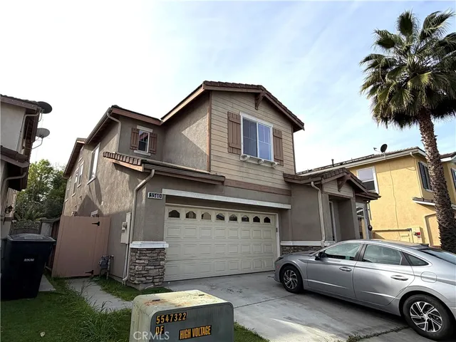 a car parked in front of a house