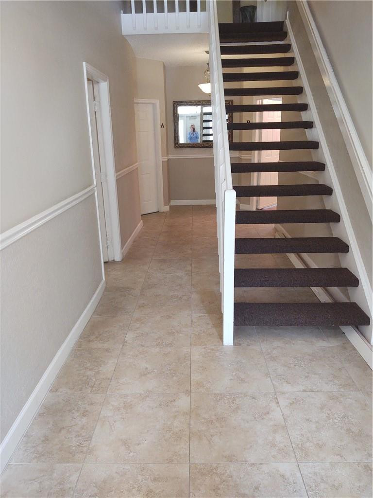 5801 Coach House Circle, Unit B Boca Raton, FL 33486 - Photo 5 of 39 Walking into the secure lobby
