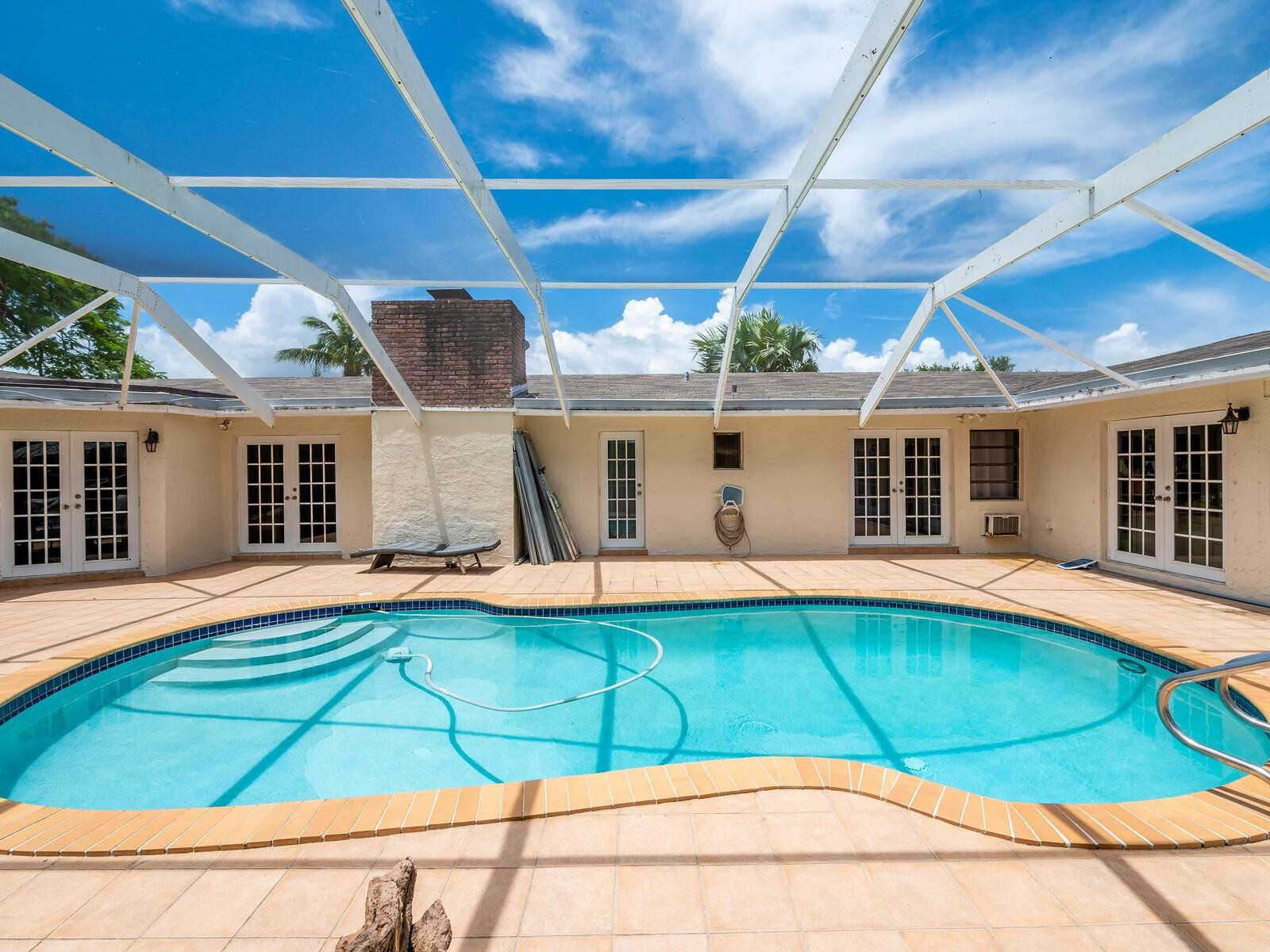 17640 Southwest 52nd Court Southwest Ranches, FL 33331 - Photo 11 of 90 ALL FRENCH DOORS TO PATIO ARE IMPACT