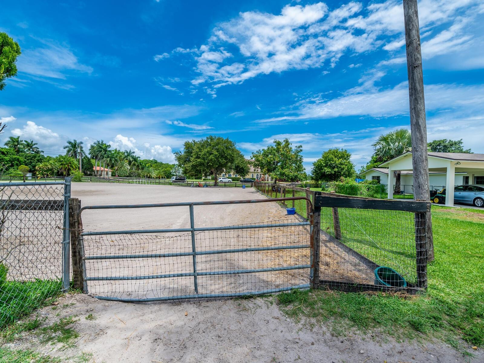 17640 Southwest 52nd Court Southwest Ranches, FL 33331 - Photo 28 of 90 GATE TO ARENA 15 FEET FROM STALLS