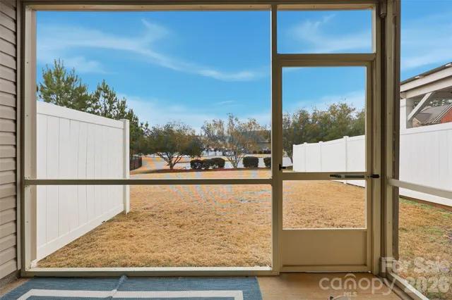 a bathroom with a shower sink and mirror