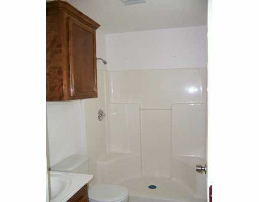 309 Easy Street, Unit A Corpus Christi, TX 78418 - Photo 8 of 8 a bathroom with a shower