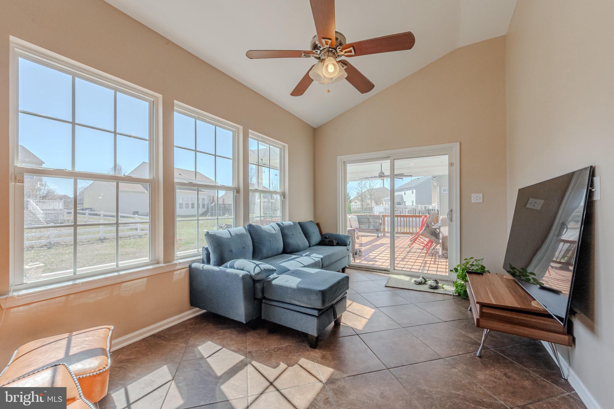 216 Alloway Place Townsend, DE 19734 - Photo 12 of 40 a living room with furniture and a window