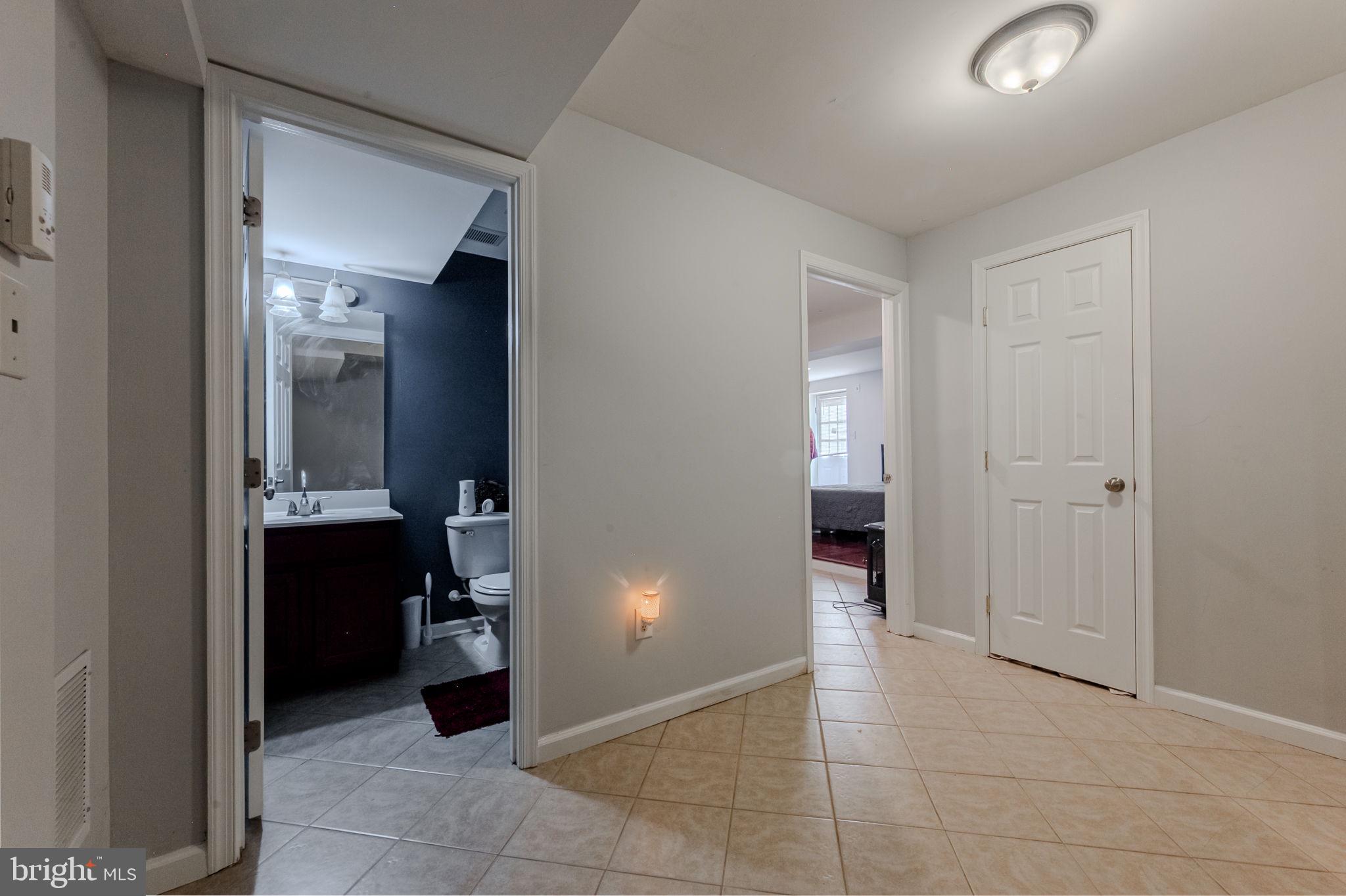216 Alloway Place Townsend, DE 19734 - Photo 28 of 40 a bathroom with a sink and a mirror