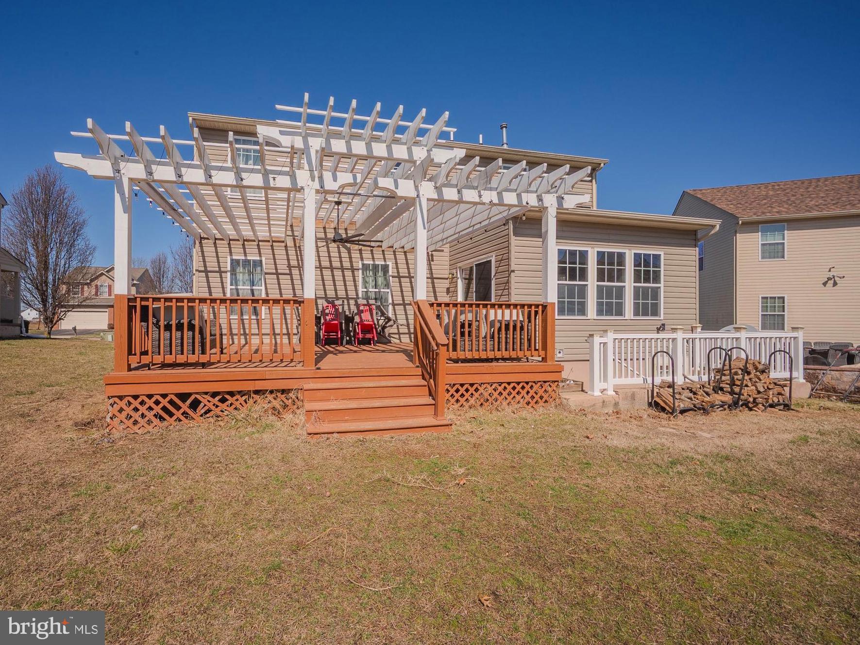 216 Alloway Place Townsend, DE 19734 - Photo 36 of 40 a view of a building with barbeque grill and a bench