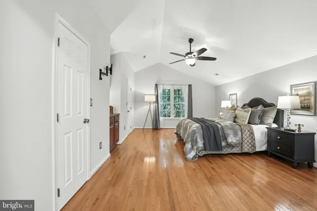 a bathroom with a tub a toilet and a shower
