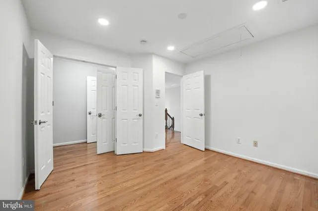 a view of a room that has a window in it