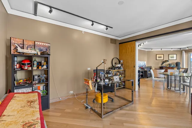a view of a livingroom with furniture and toys