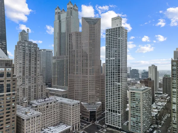 a view of a city with tall buildings
